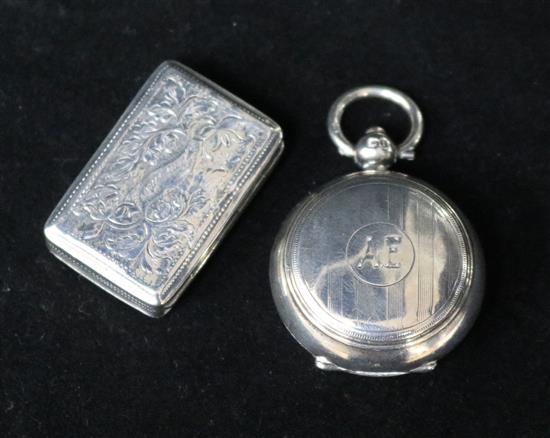 A George V silver sovereign case and a William IV silver vinaigrette.